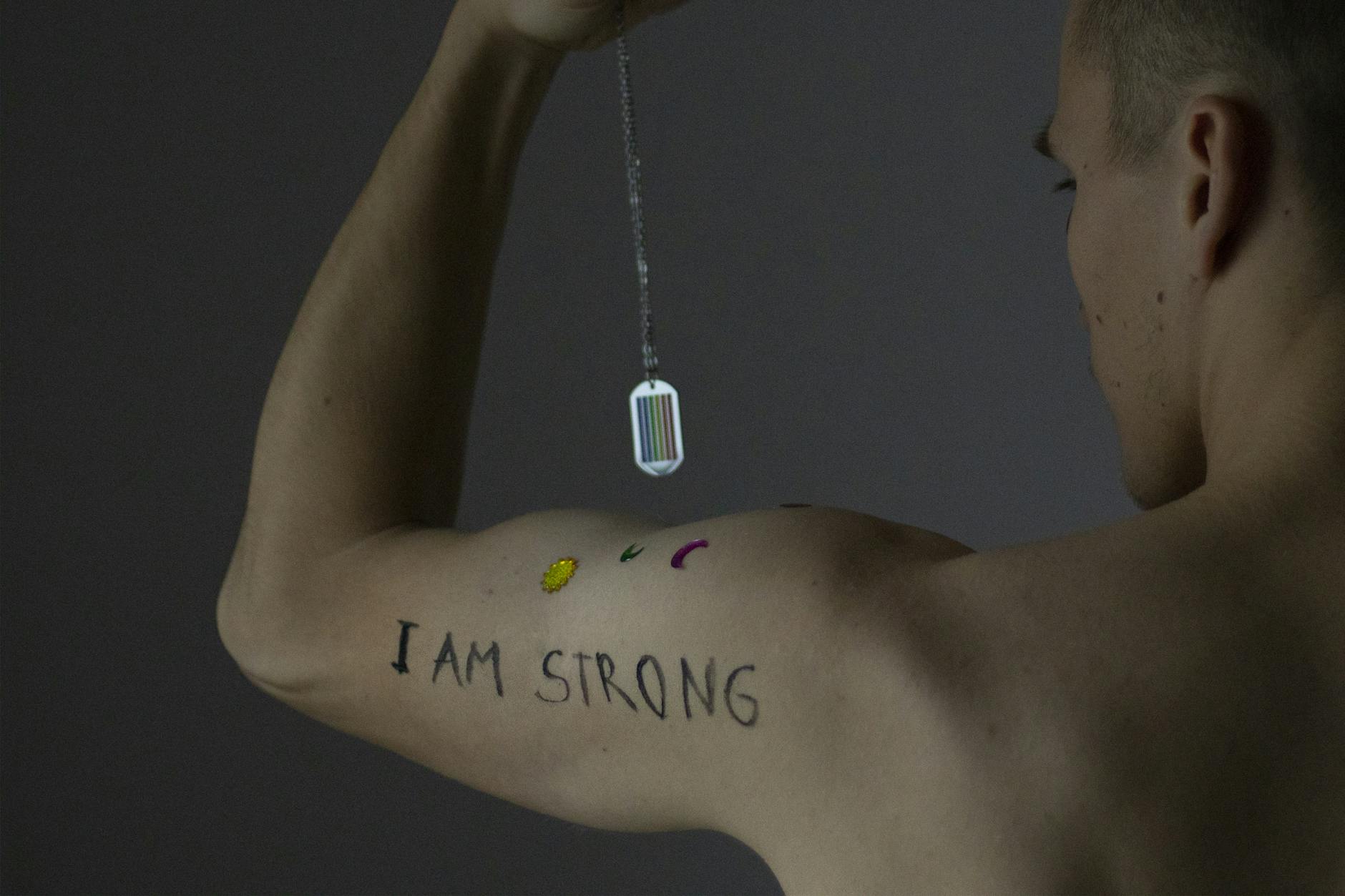 a person holding a necklace